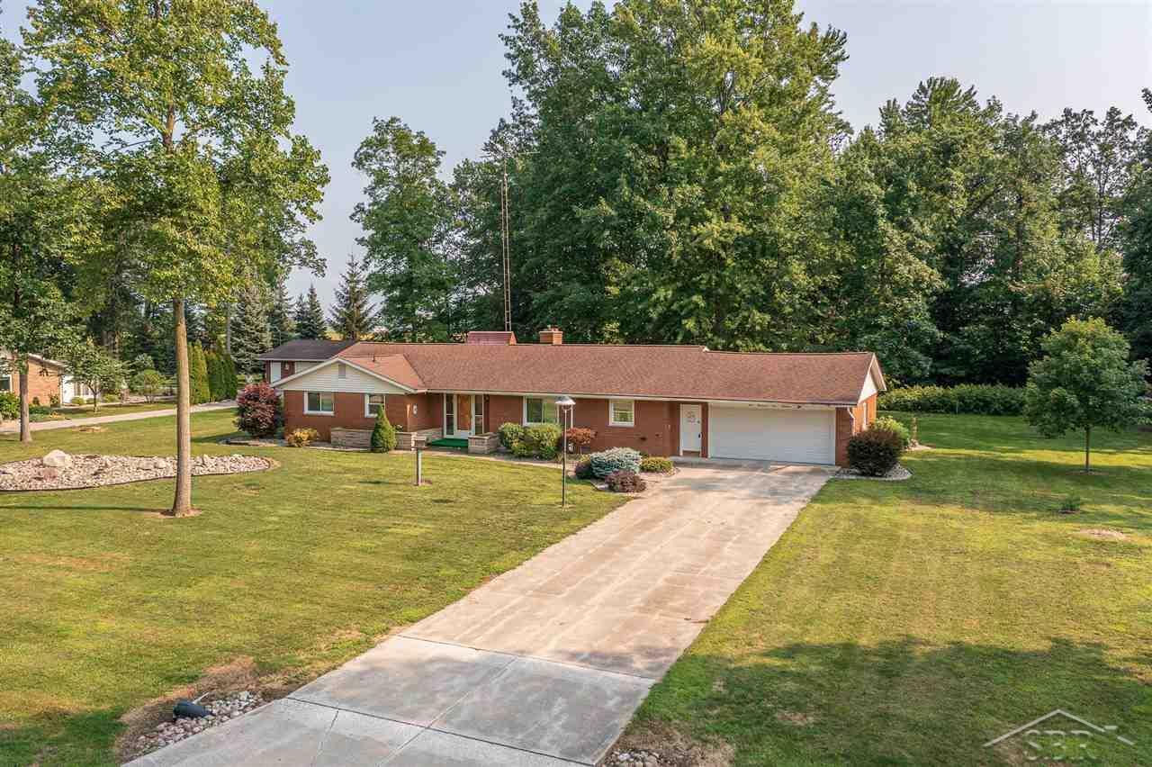 Property Photo:  10100 Silvercreek Dr  MI 48734 