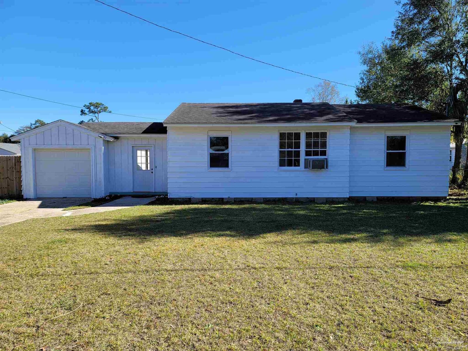 Property Photo:  203 Aster St  FL 32507 
