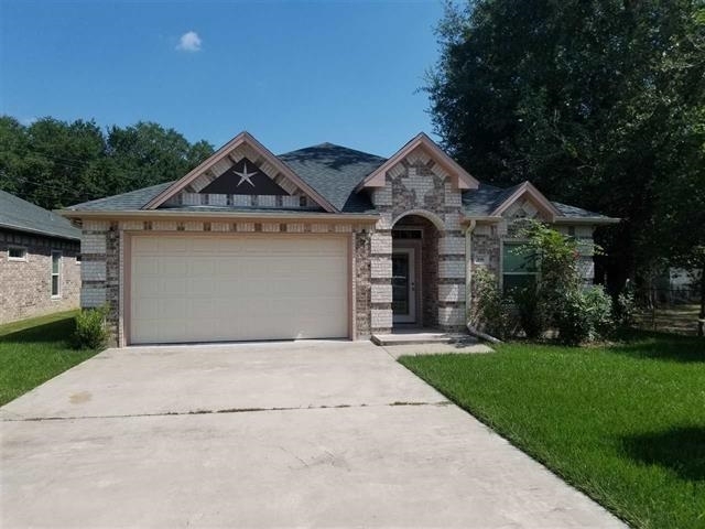 Property Photo:  106 E Cypress St.  TX 77651 