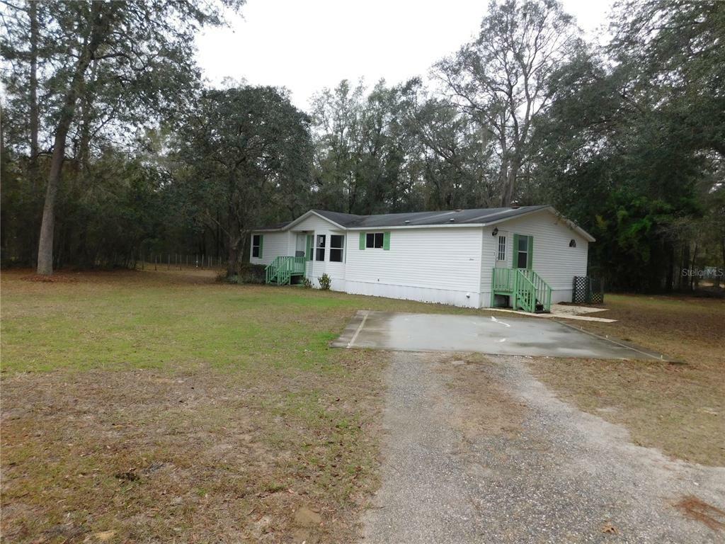 Property Photo:  10890 NE 102nd Place  FL 32618 