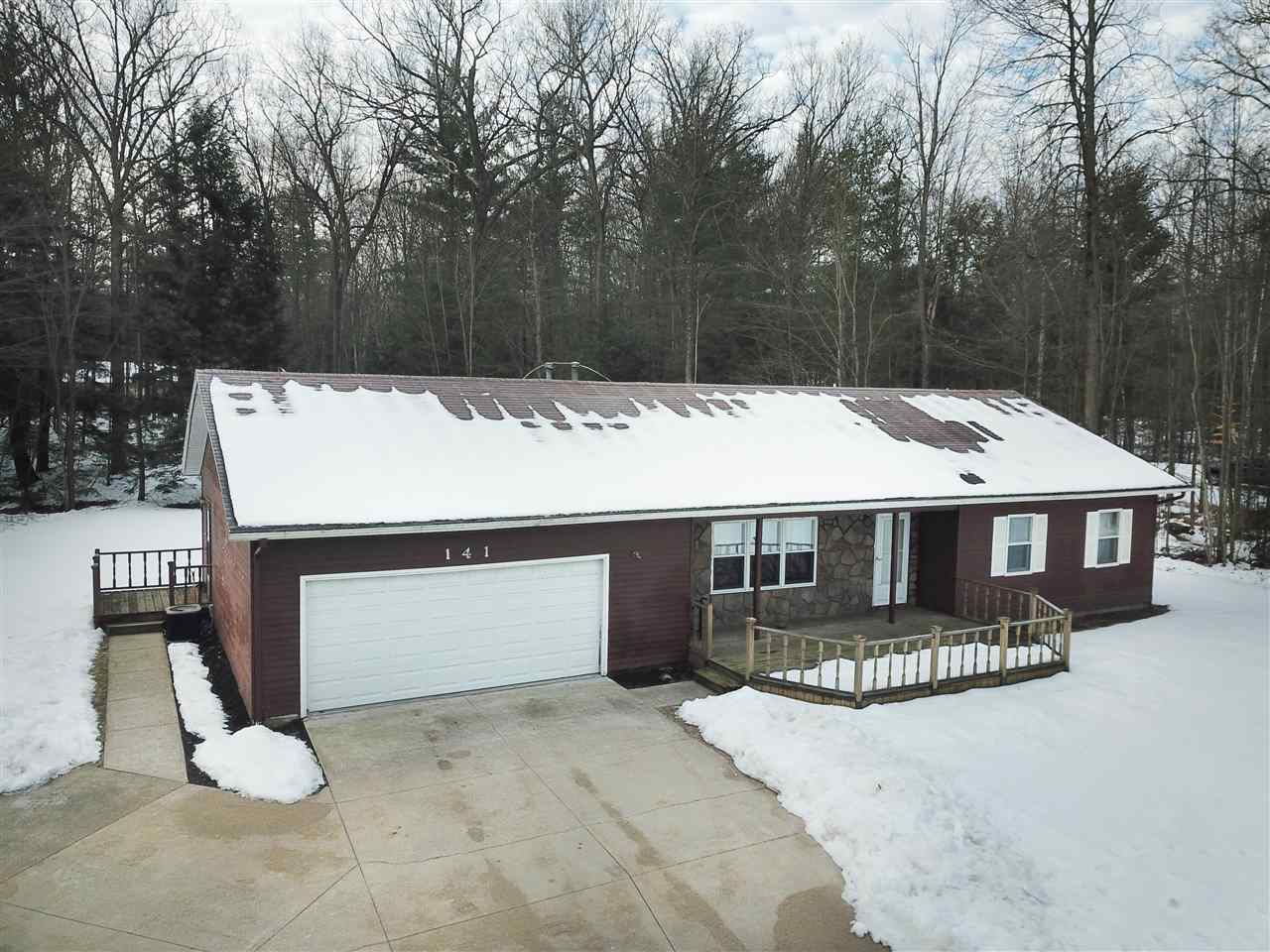 Property Photo:  141 W Sampson Drive  MI 48657 