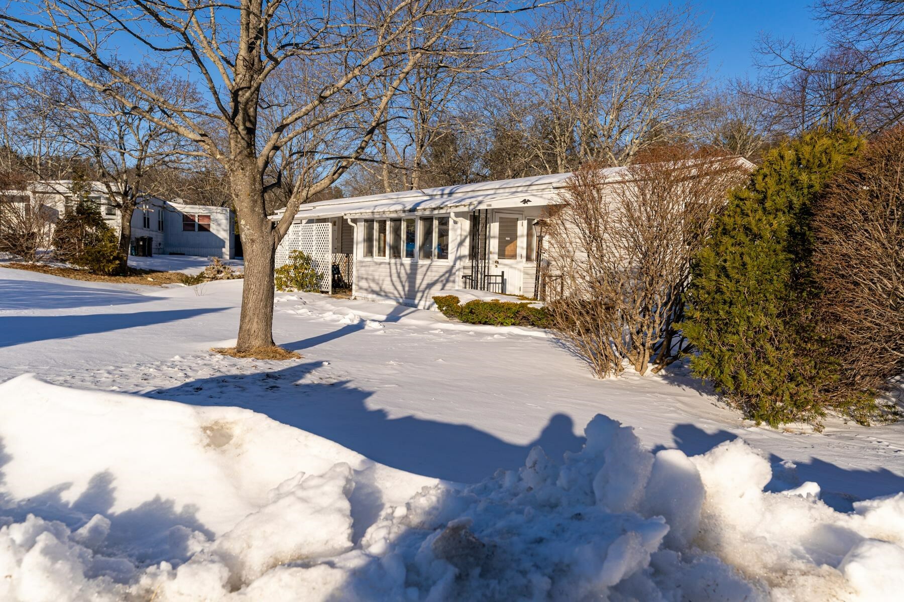 Property Photo:  4 Arrowbrook Road  NH 03820 