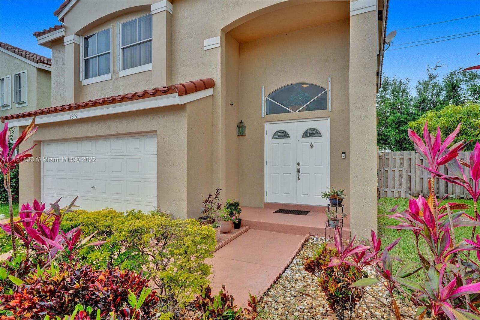 Property Photo: 7309 Flores Way FL 33063