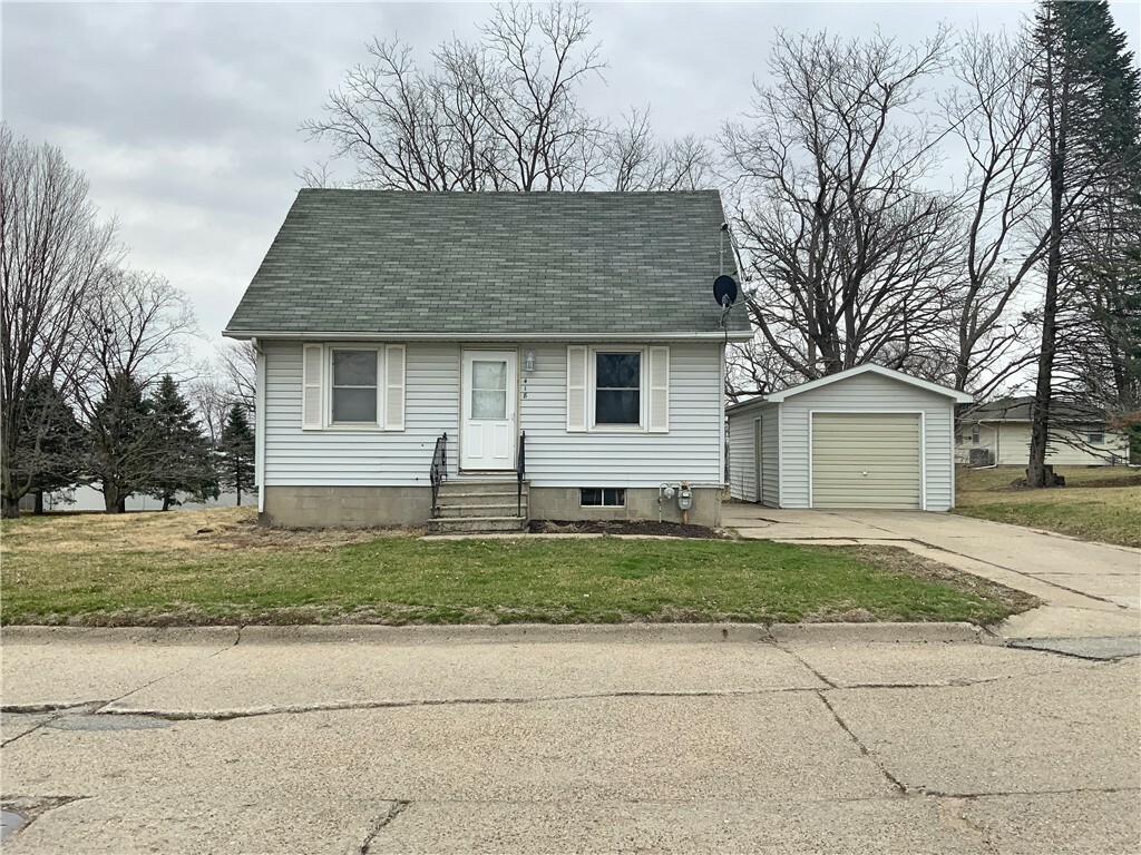 Property Photo:  418 E 11th Street S  IA 50208 