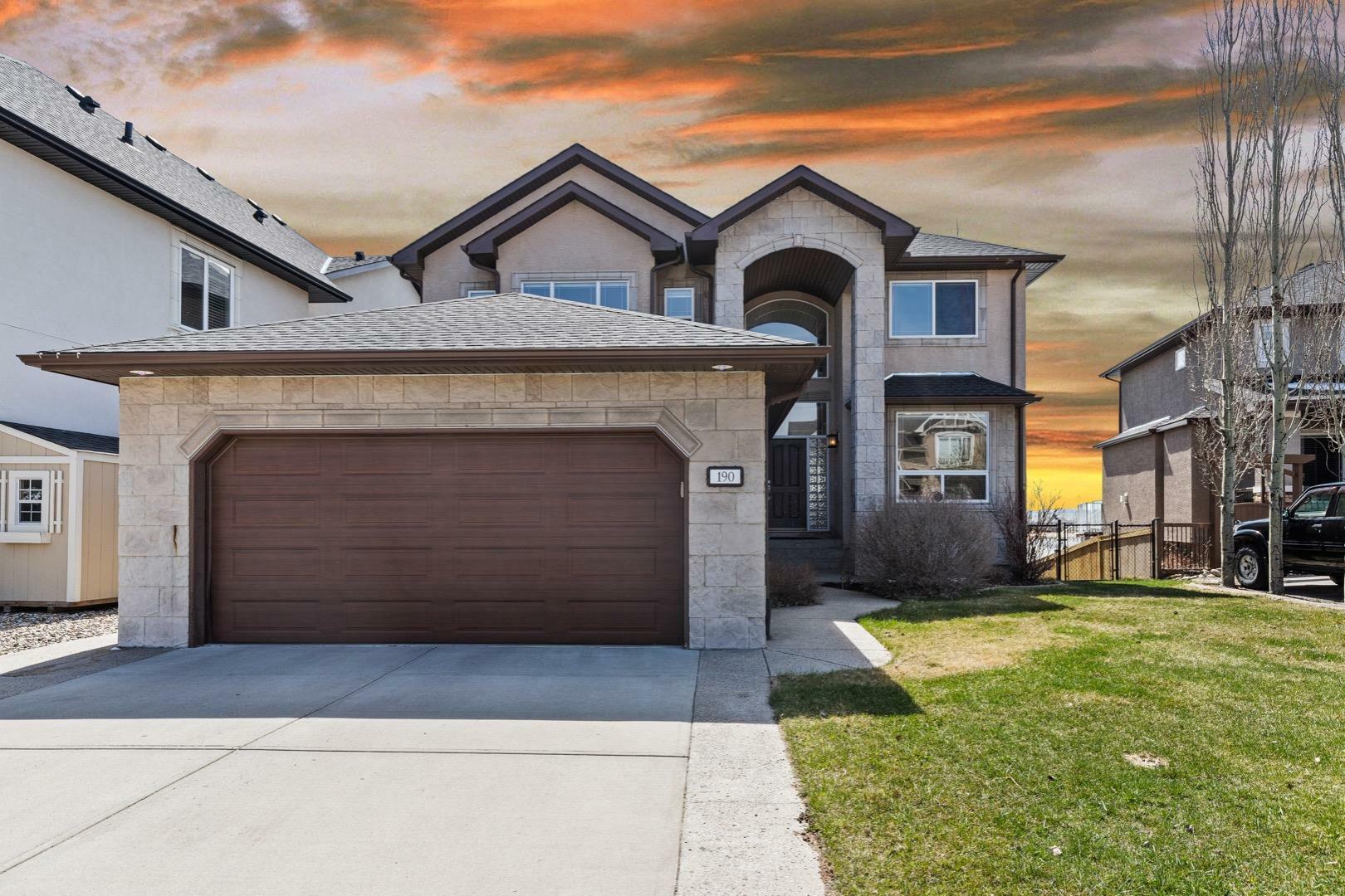 Property Photo: 190 Crystal Shores Drive AB T1S 2L1