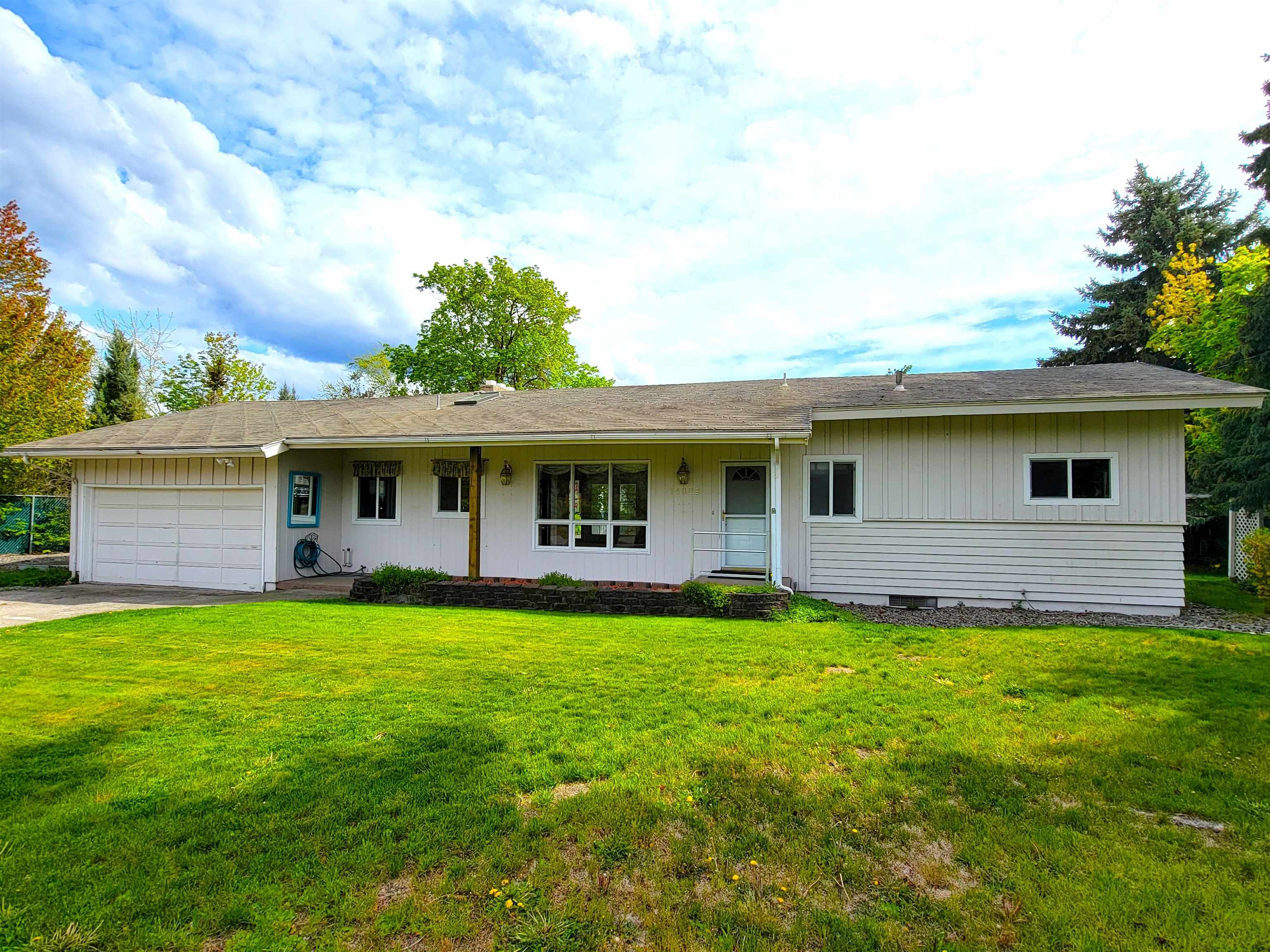 Property Photo: 14822 E Riverside Ave WA 99216