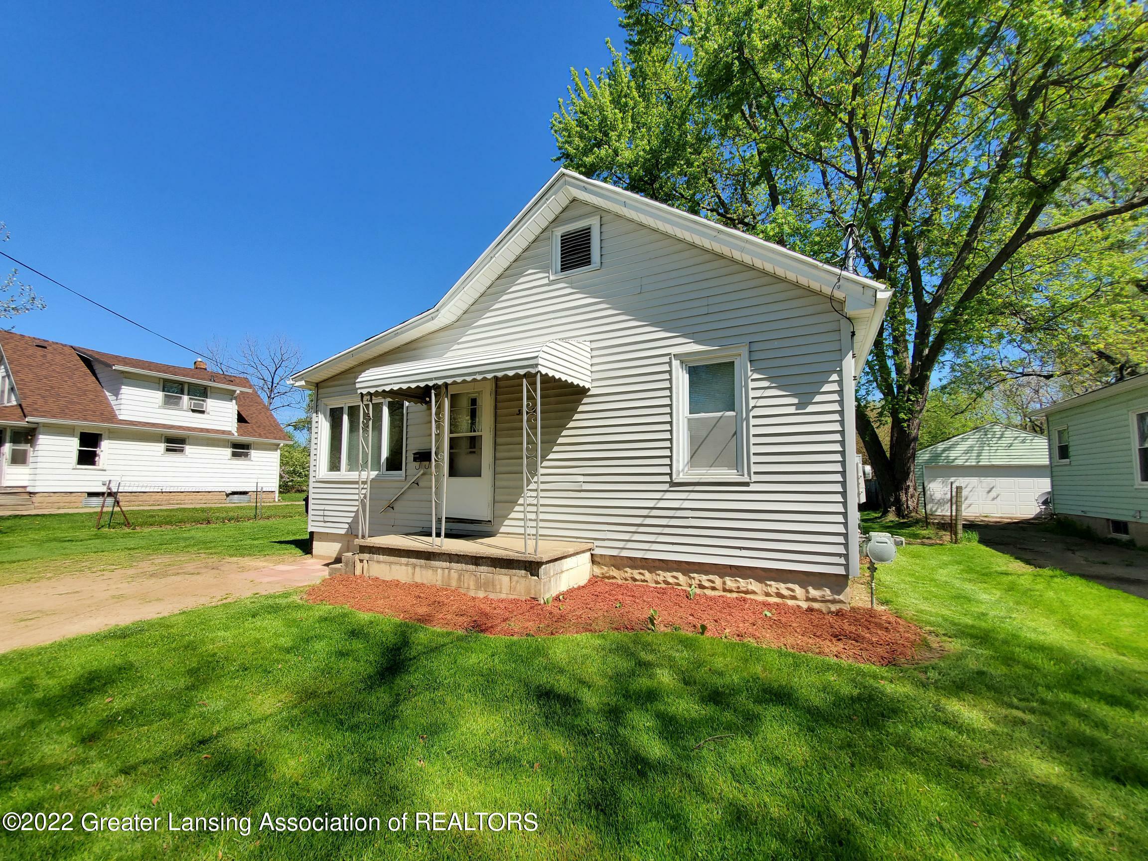 Property Photo:  309 E Gier Street  MI 48906 