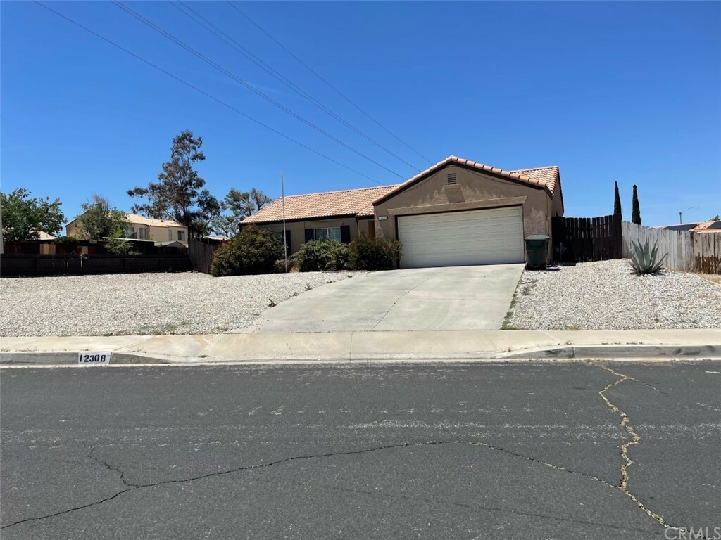 Property Photo:  12308 Softwind Drive  CA 92395 