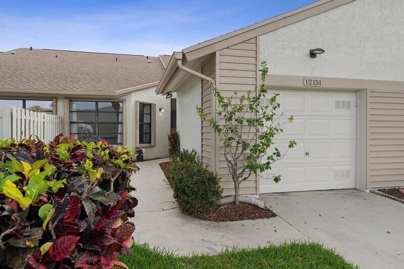 Property Photo:  12151 Forest Greens Drive  FL 33437 