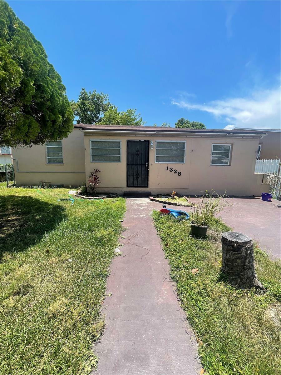 Property Photo:  1328 NW 38th St  FL 33142 