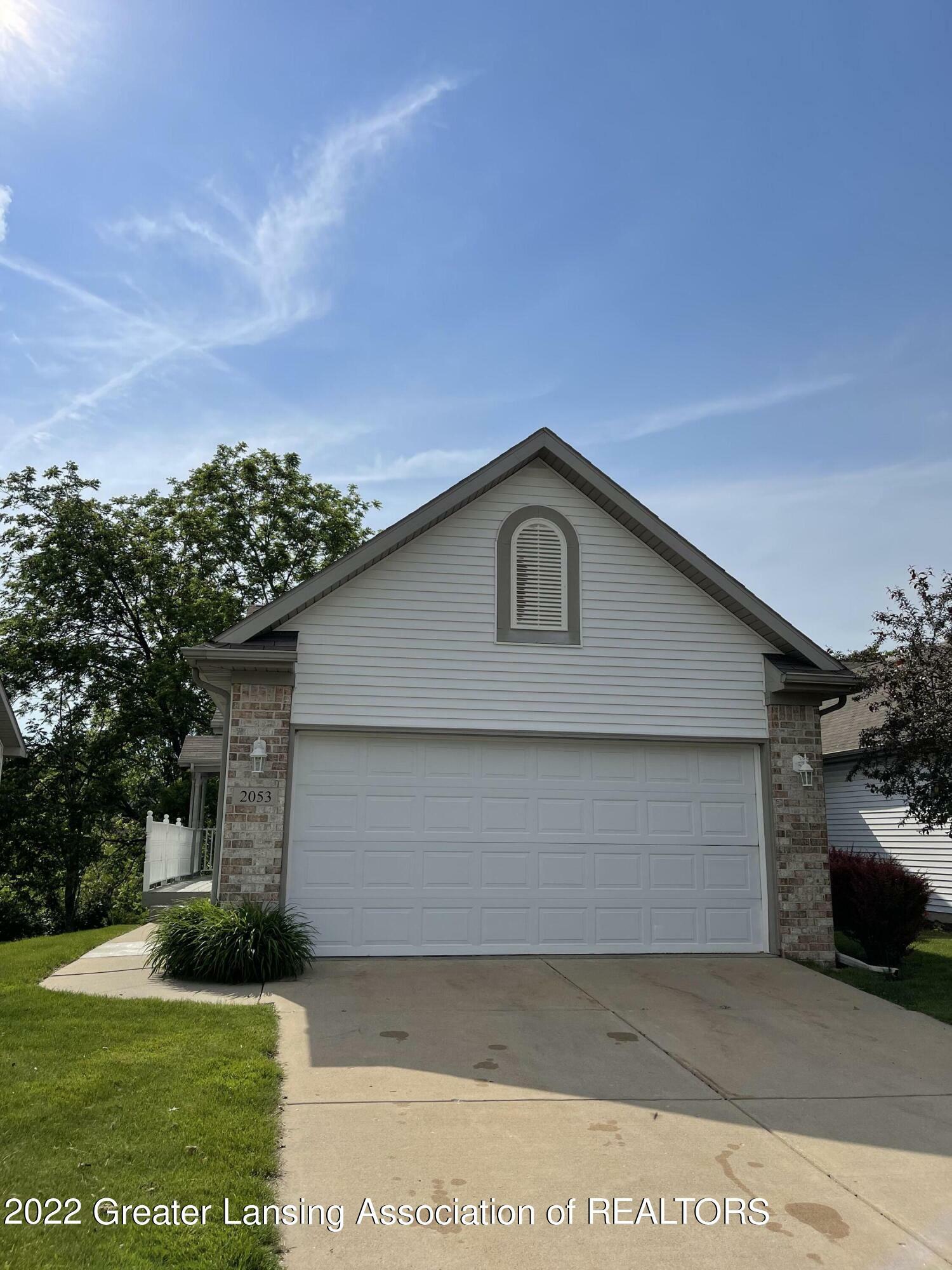 Property Photo:  2053 Wyndham Hills Drive  MI 48842 