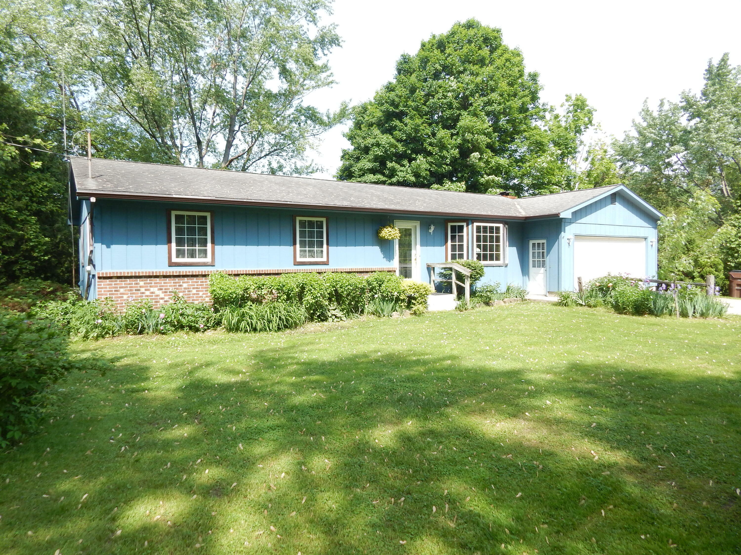 Property Photo:  5725 Pine Island Drive NE  MI 49321 