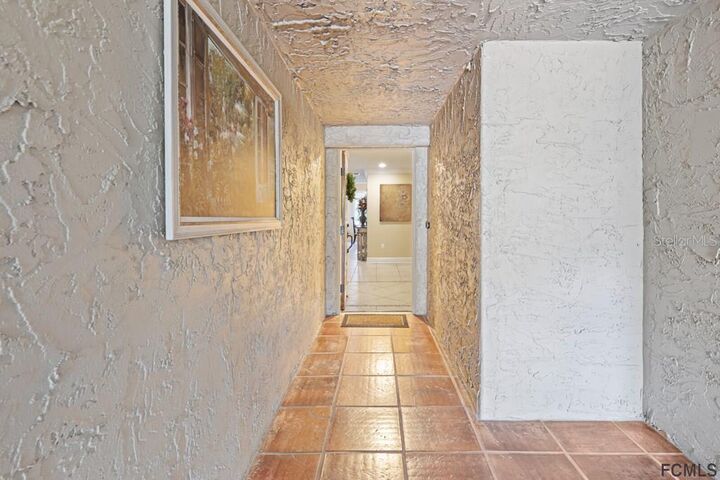 Property Photo:  112 Club House Drive 102  FL 32137 