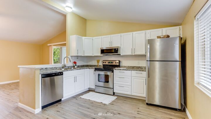 Property Photo:  12617 142nd Avenue E 105  WA 98374 