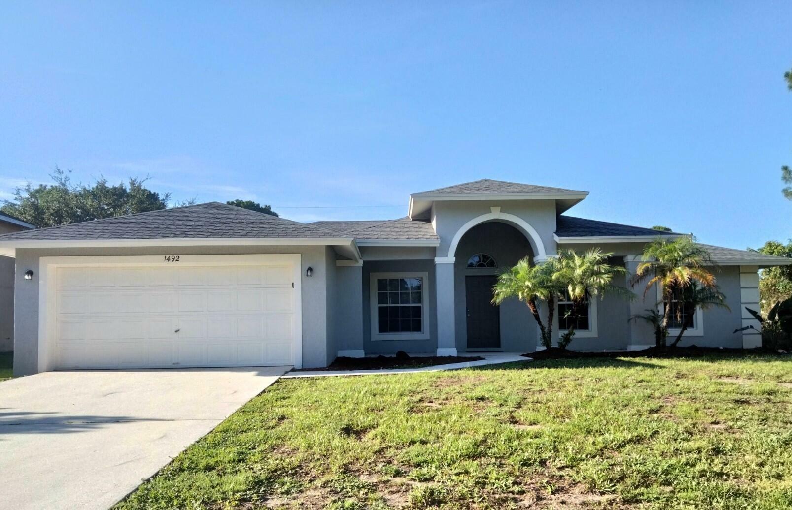 Property Photo:  1492 SW Devera Avenue  FL 34953 