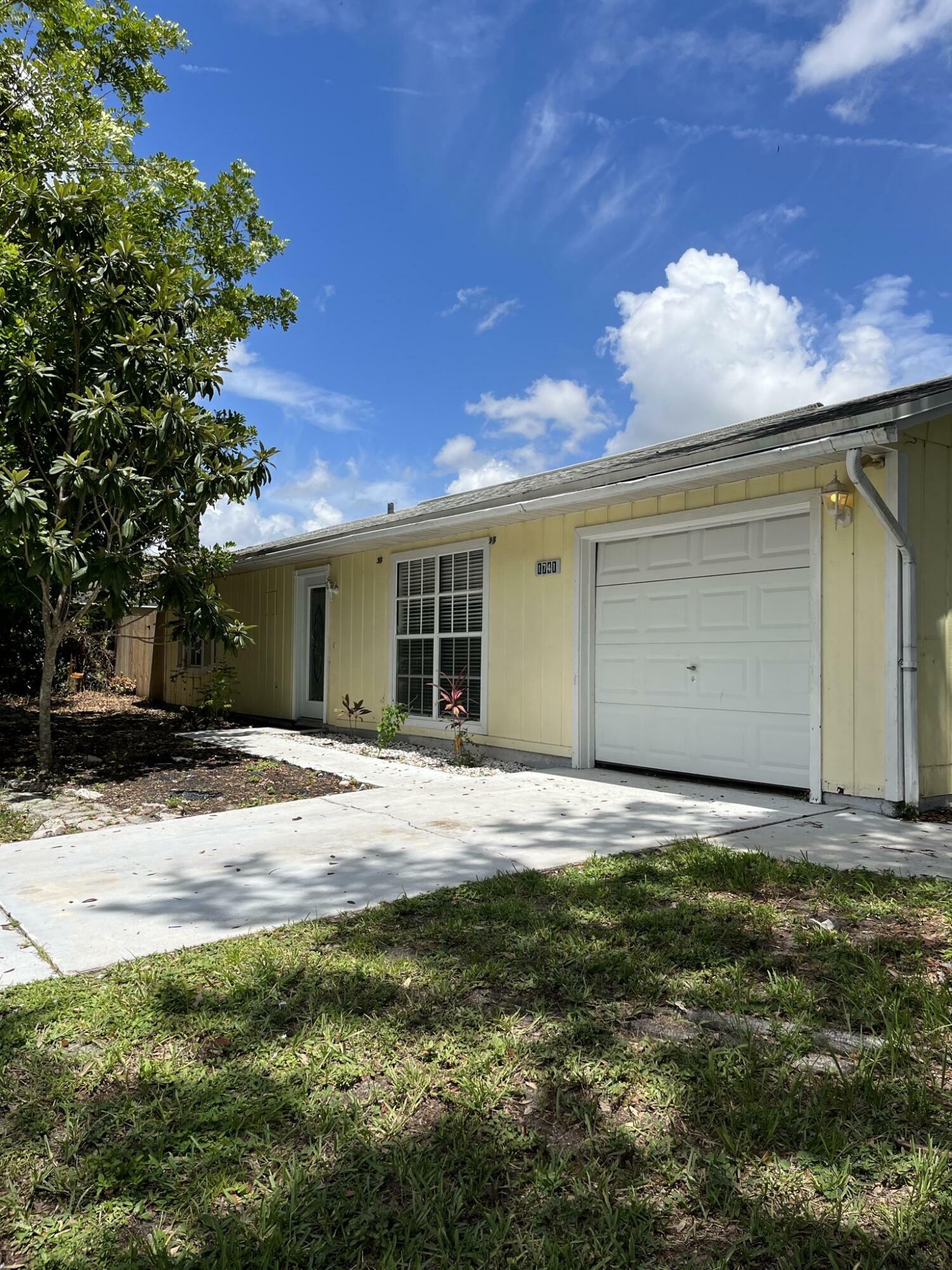 Property Photo:  1741 SW Millikin Avenue  FL 34953 