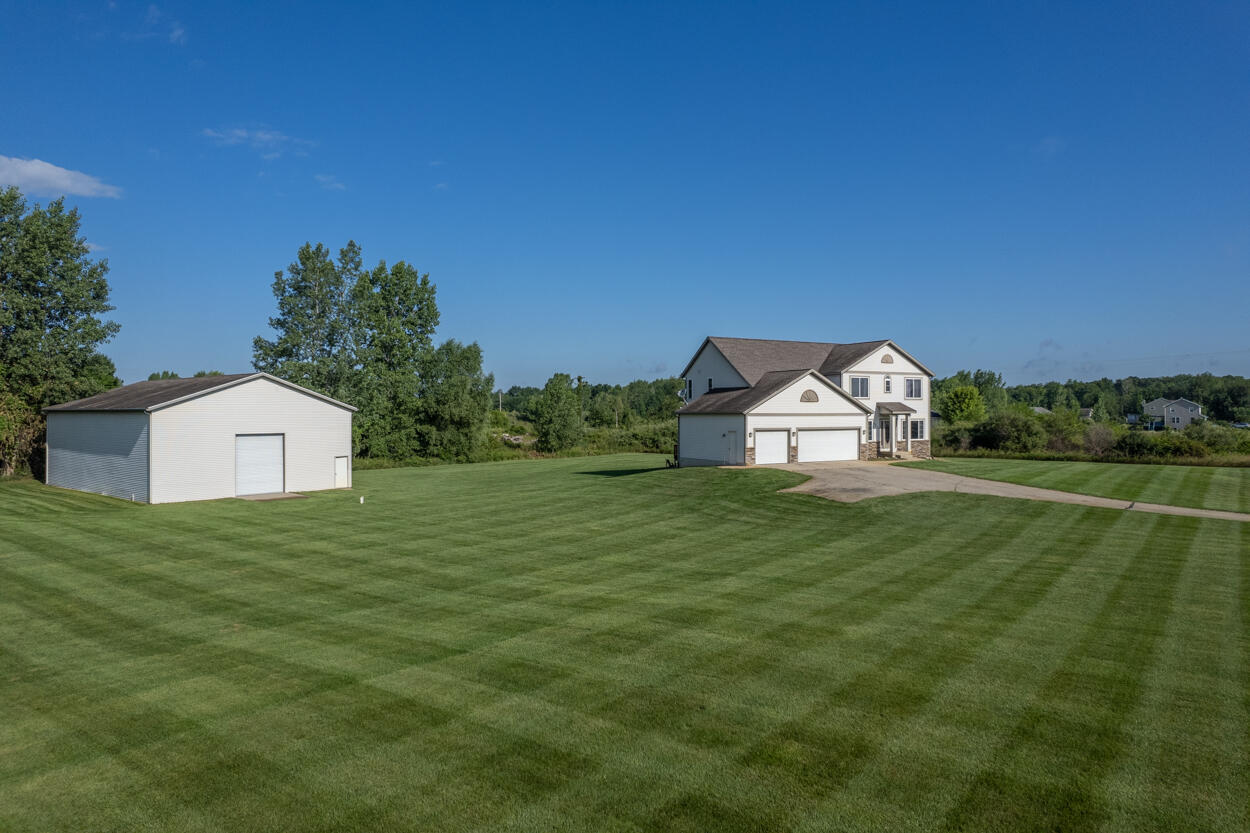 Property Photo: 9225 Pheasant Trail NE MI 49341