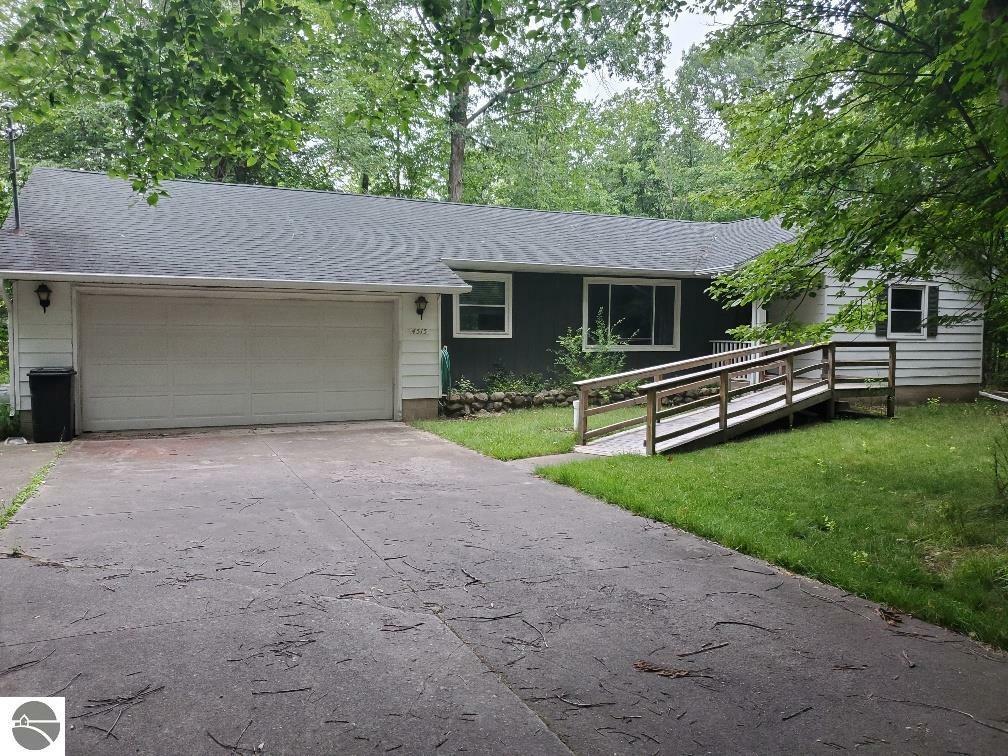 Property Photo:  4515 Blue Cedar Drive  MI 48858 