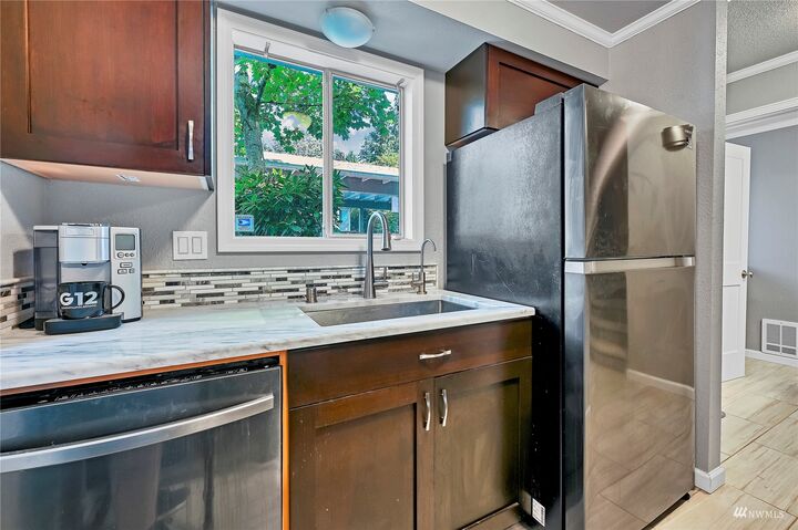 Property Photo:  18910  Bothell-Everett Highway E-2  WA 98012 