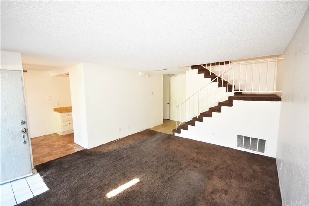 Property Photo:  1380 W 48th Street 48  CA 92407 