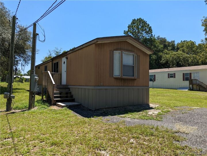 Property Photo:  7090 N Palmer Way  FL 34442 