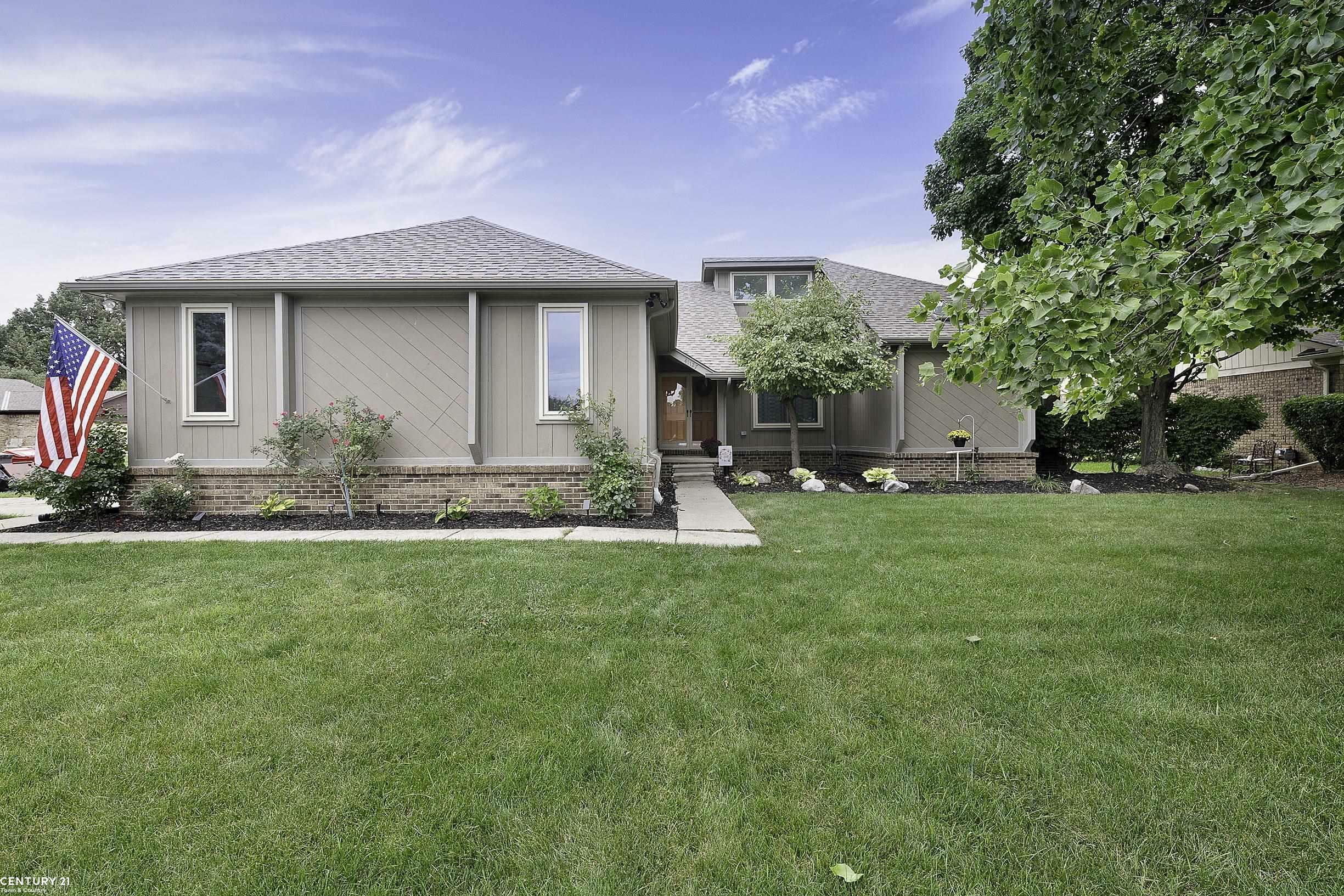 Property Photo:  41127 Justin Dr  MI 48038 