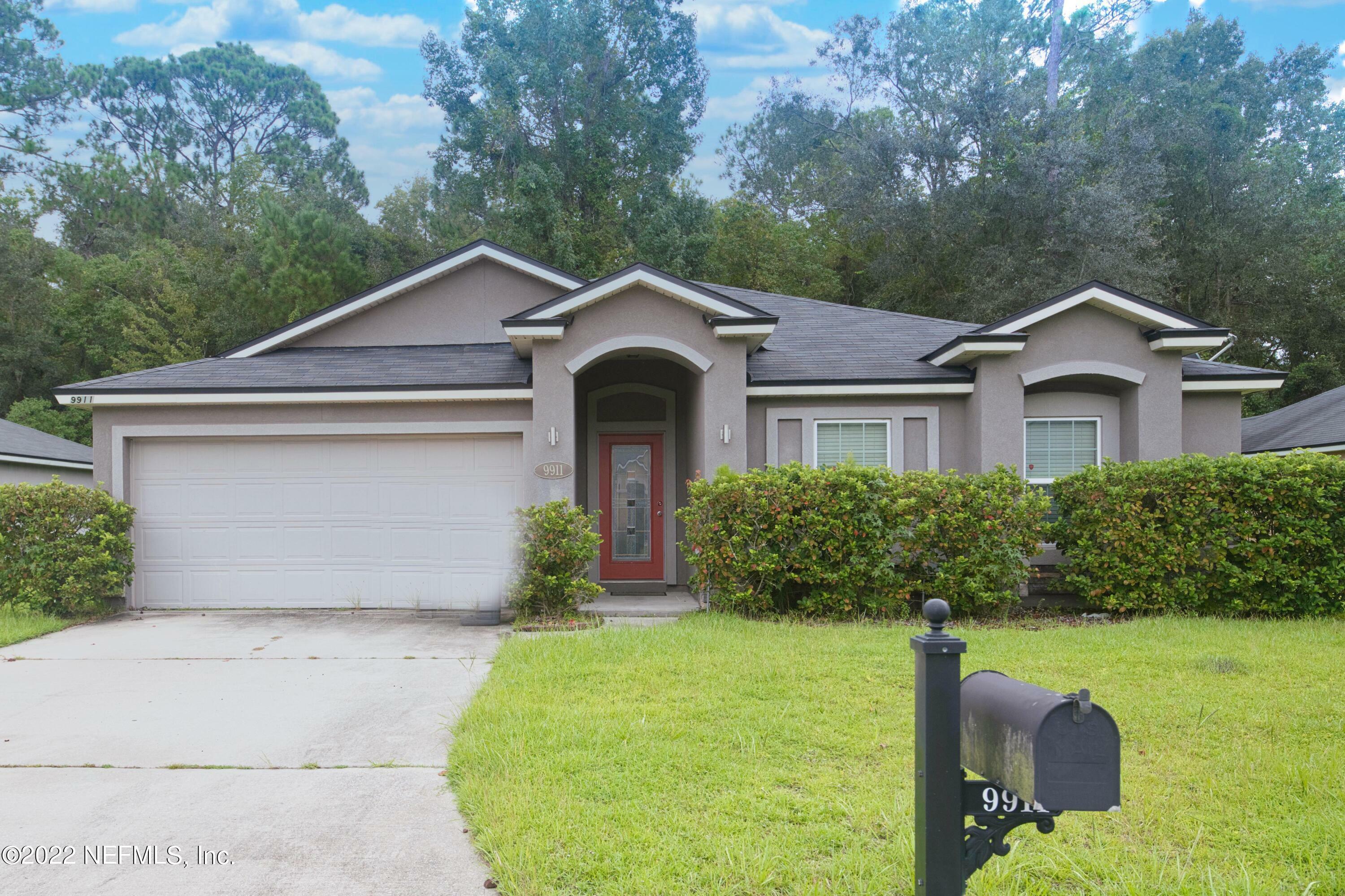 Property Photo:  9911 Timber Falls Lane  FL 32219 