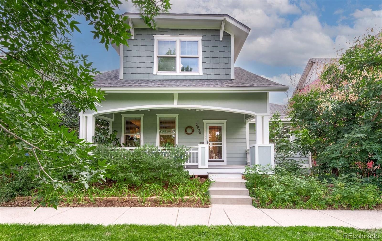 Property Photo:  2626 Emporia Street  CO 80238 