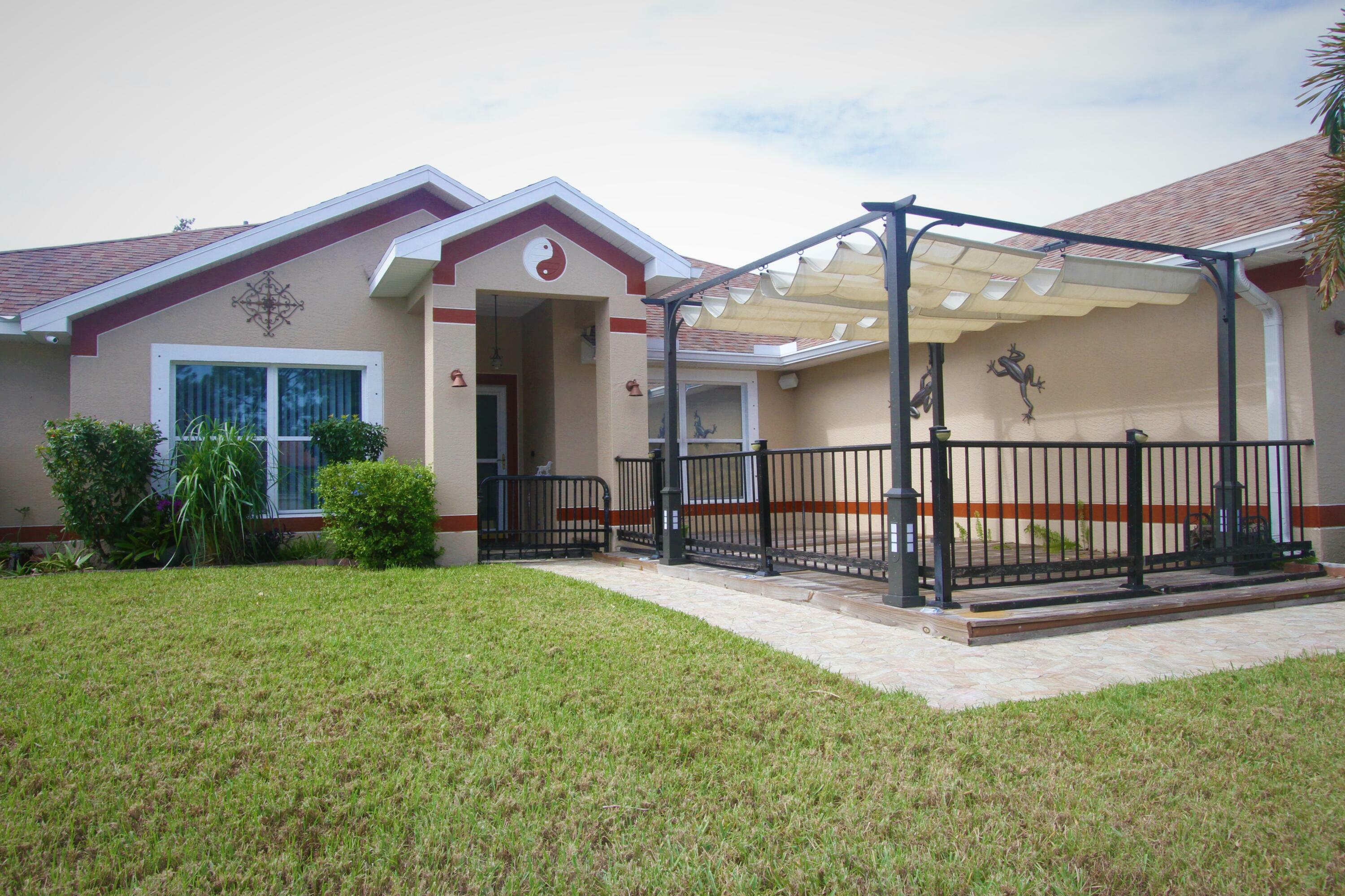 Property Photo: 1648 SW Burlington Street FL 34984