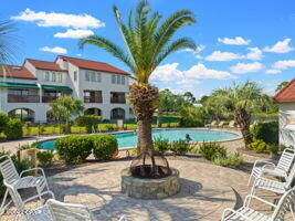 Property Photo:  8730 Thomas Drive 1210C  FL 32408 