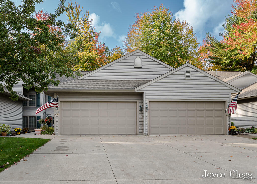 Property Photo:  587 Tournament Circle  MI 49444 