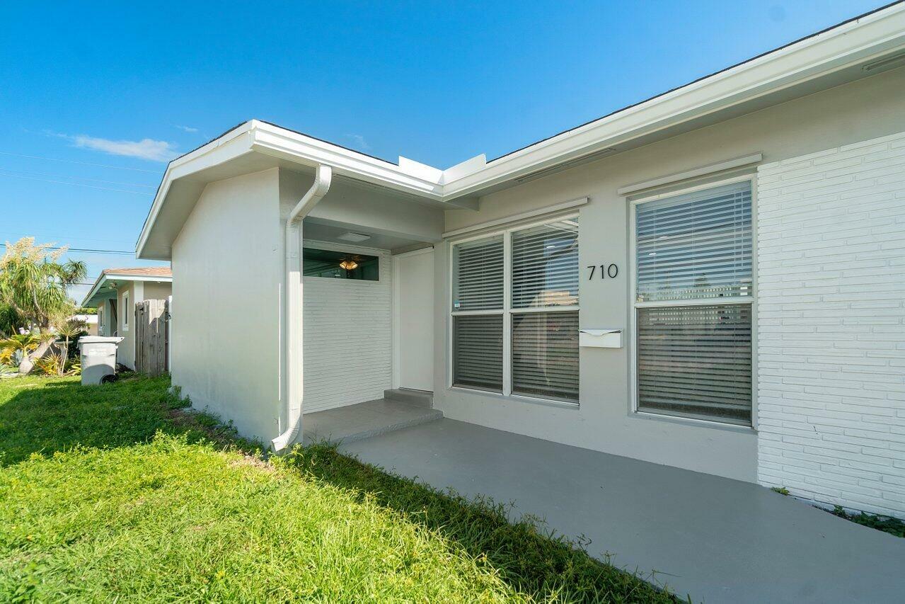 Property Photo:  710 NE 23rd Avenue  FL 33062 