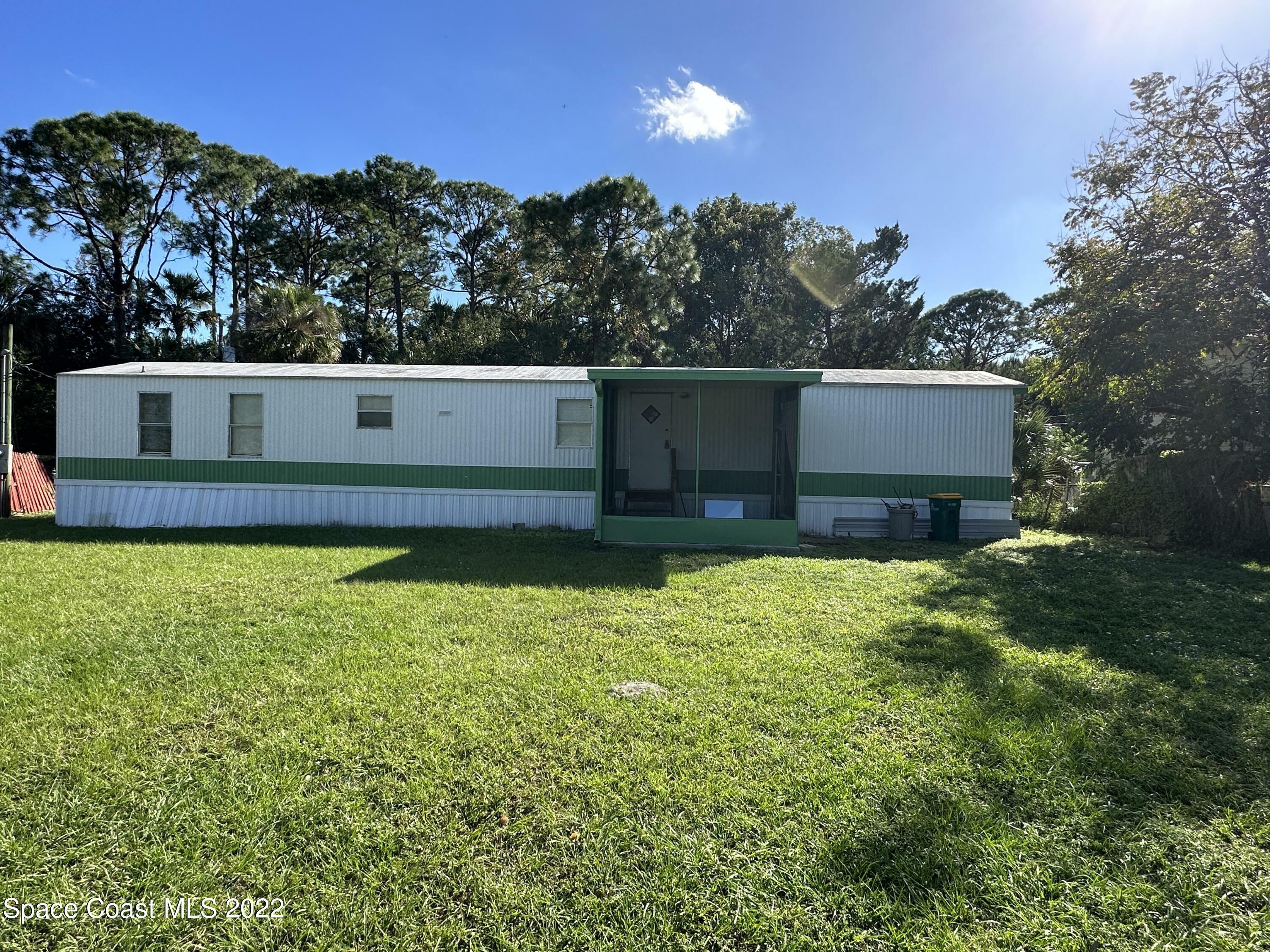 Property Photo: 305 Wixie Street FL 32927