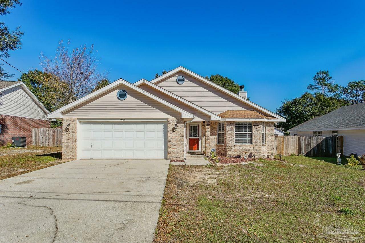 Property Photo: 5966 Herlong Dr FL 32570