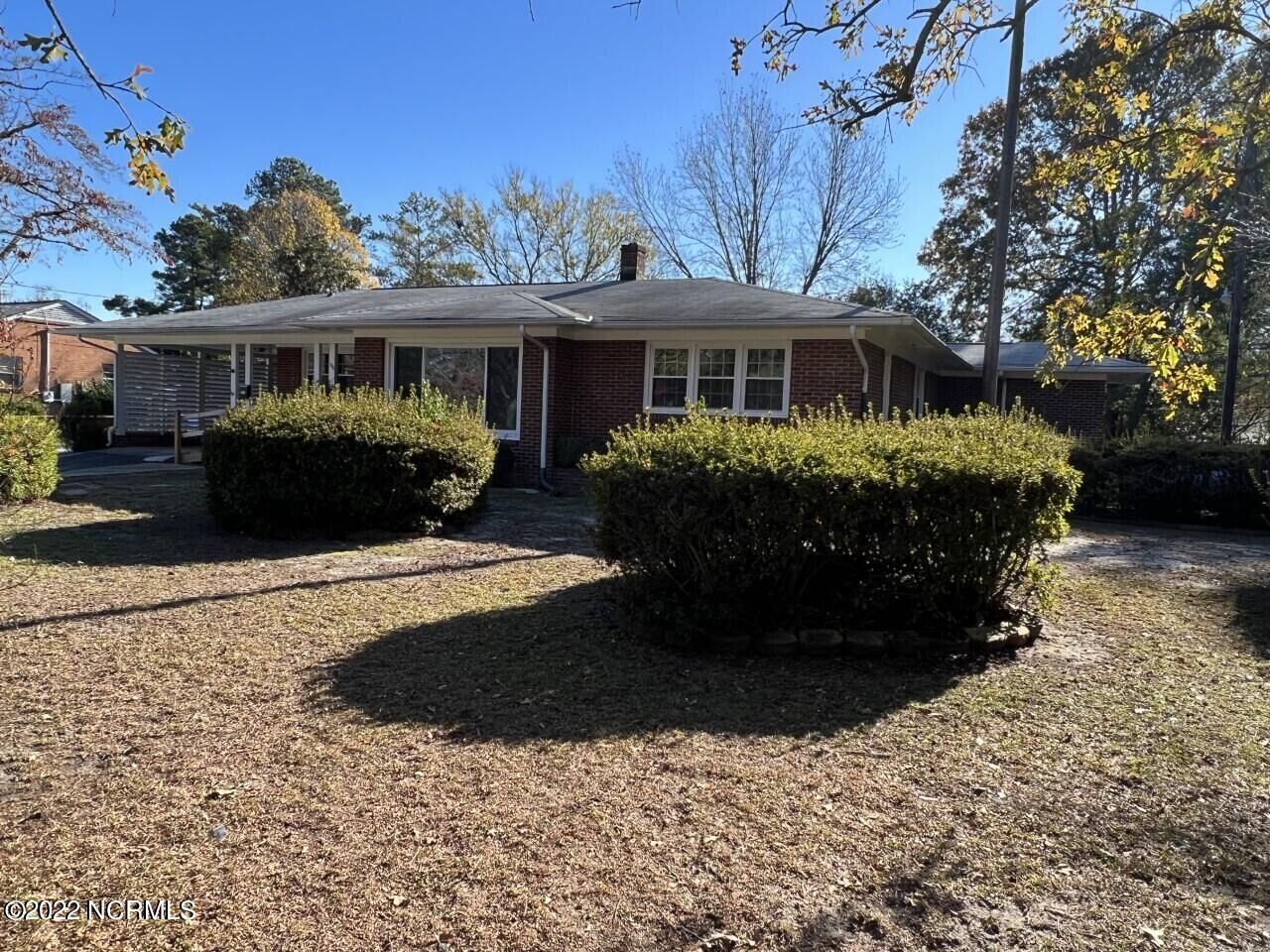 Property Photo:  306 Tokay Drive  NC 28301 