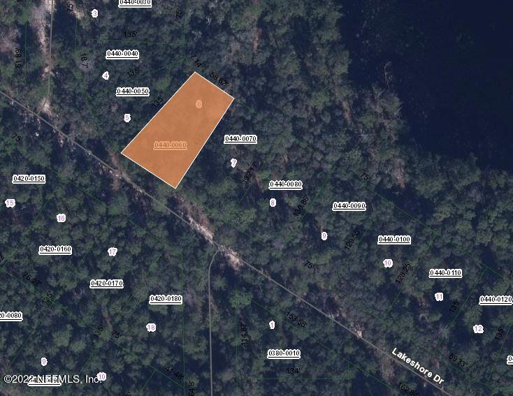 Property Photo: 112 Lakeshore Drive FL 32189