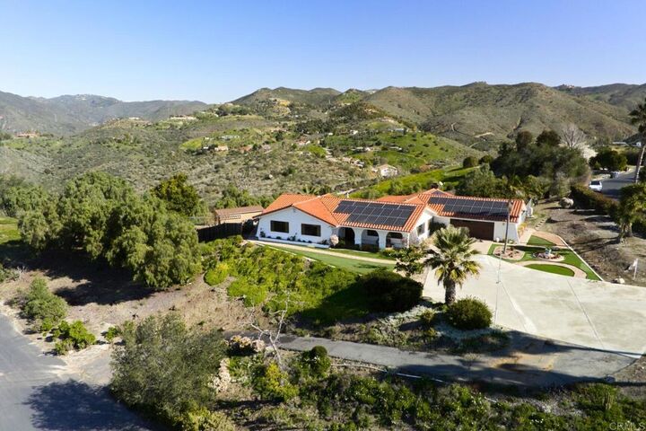 Property Photo: 1717 Macadamia Dr CA 92028