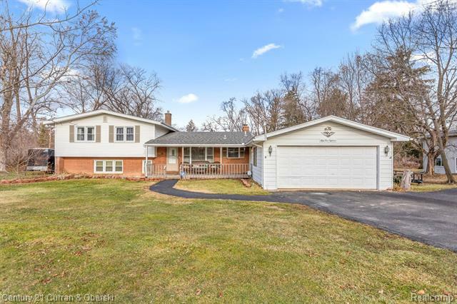 Property Photo:  5418 Calkins Road  MI 48532 