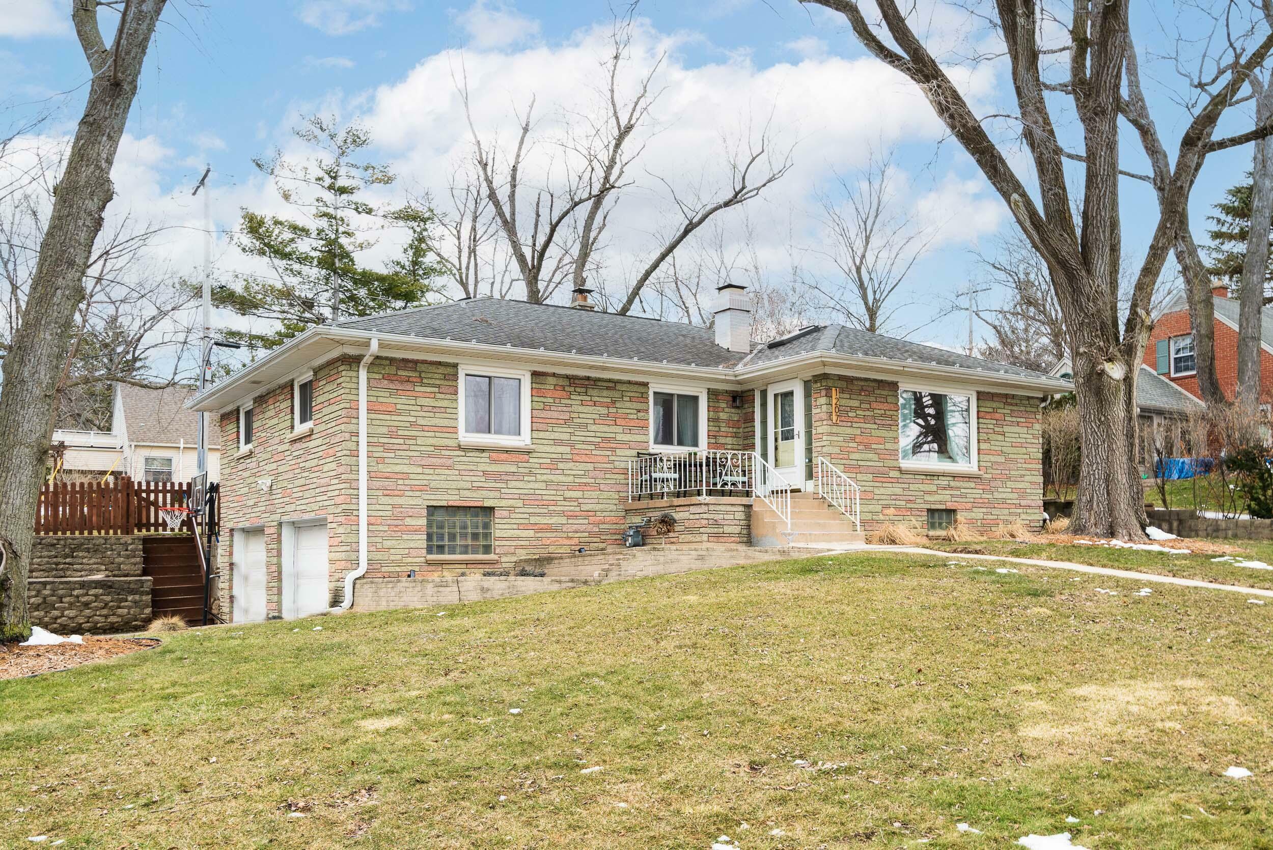 Property Photo:  1207 N 120th St  WI 53226 