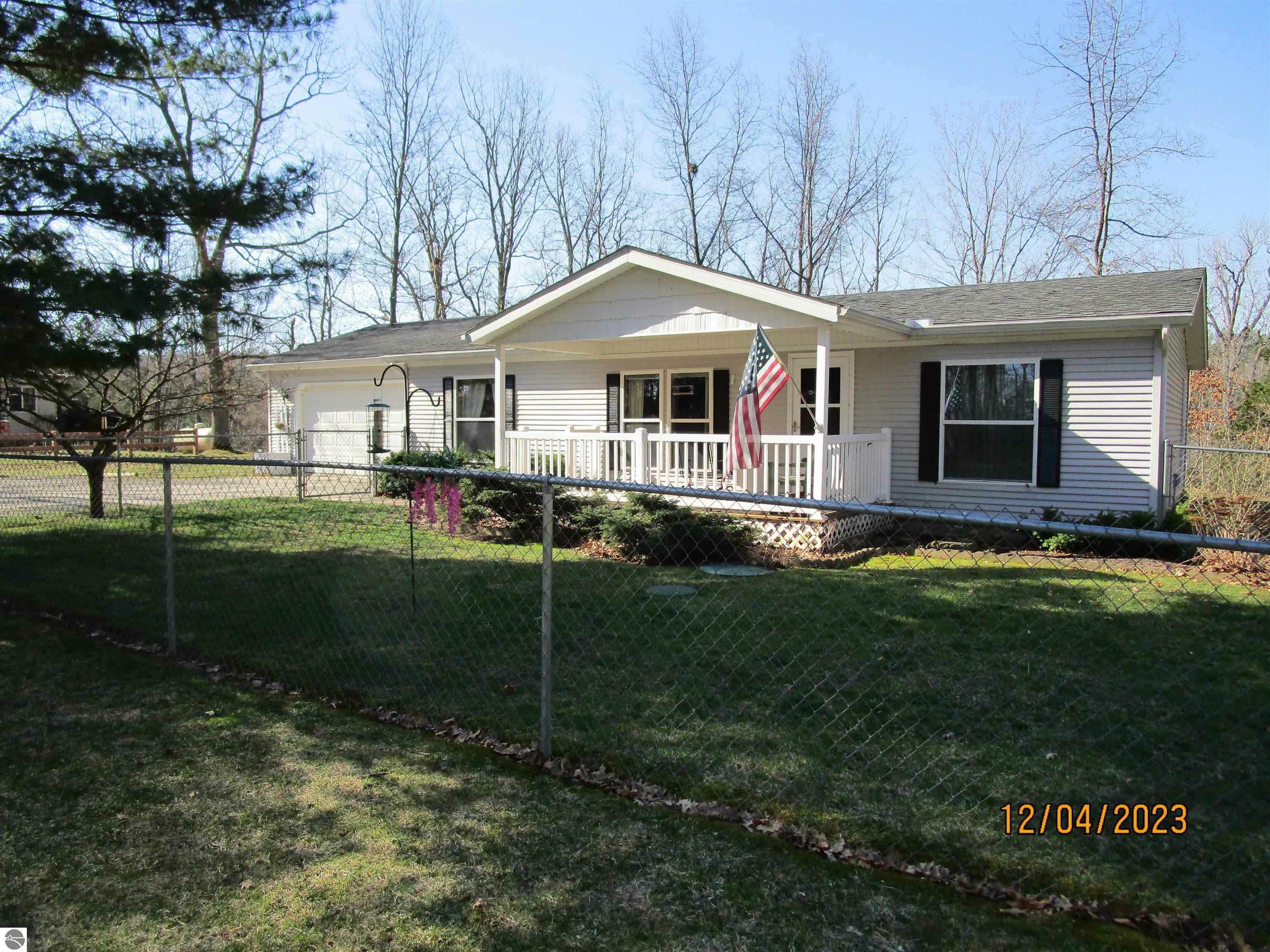 Property Photo:  4323 Caszatt Drive  MI 48858 