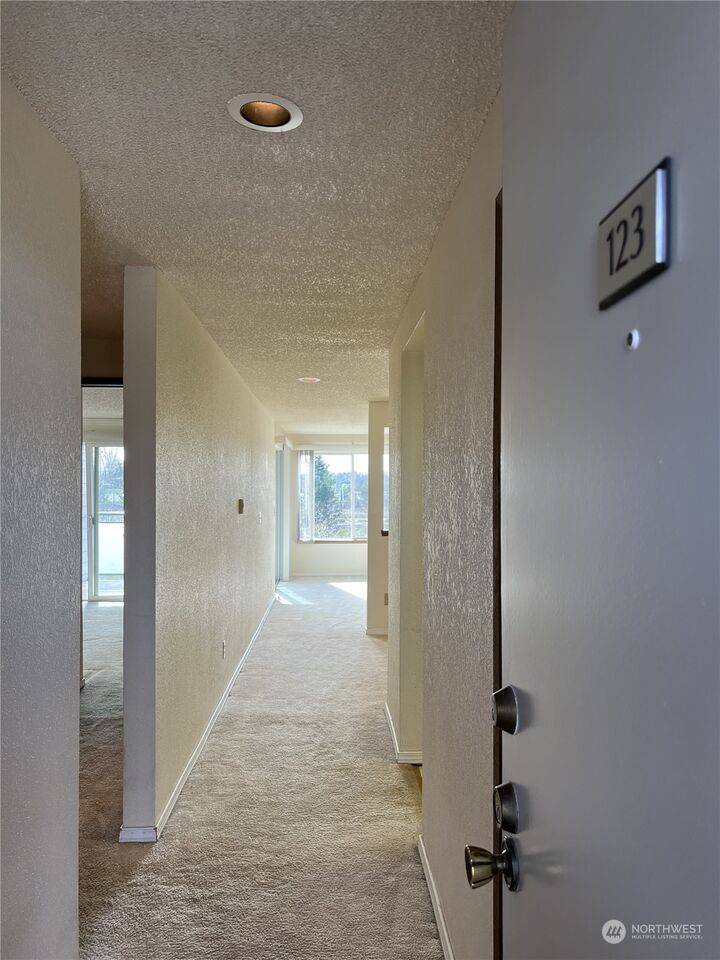 Property Photo:  2617 NE 4th Street 123  WA 98056 