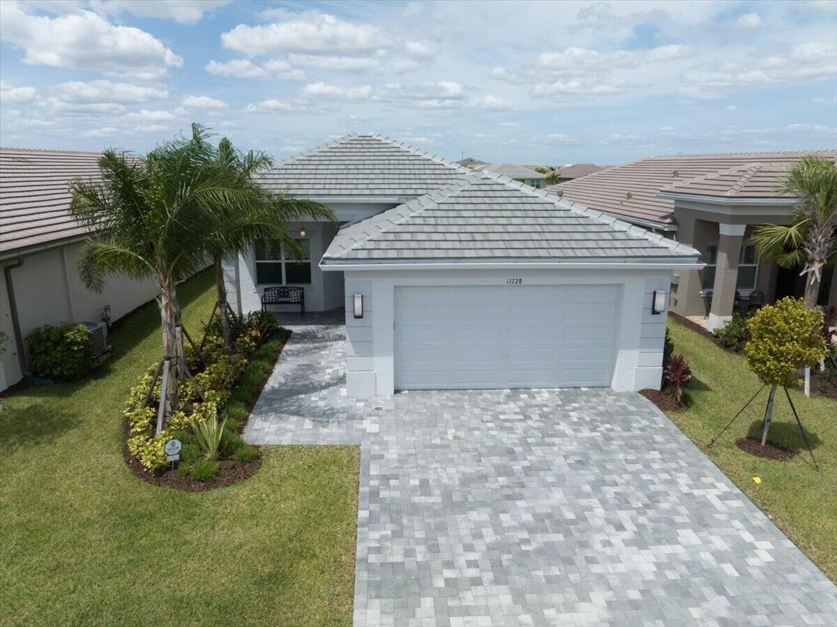 Property Photo:  11728 SW Moon River Way  FL 34987 