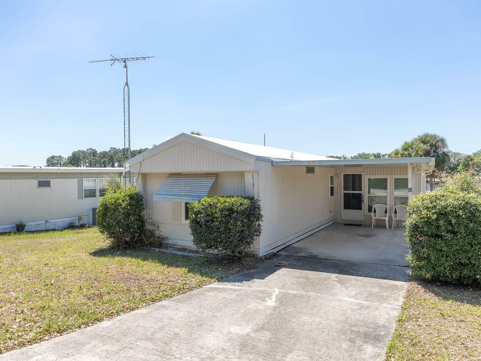 Property Photo:  24707 Palmetto Drive  FL 34748 