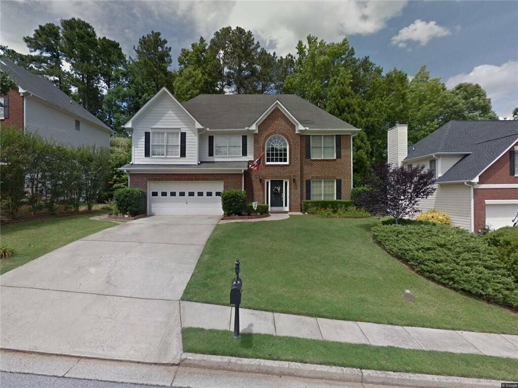 Property Photo:  1040 Bouldervista Way  GA 30043 