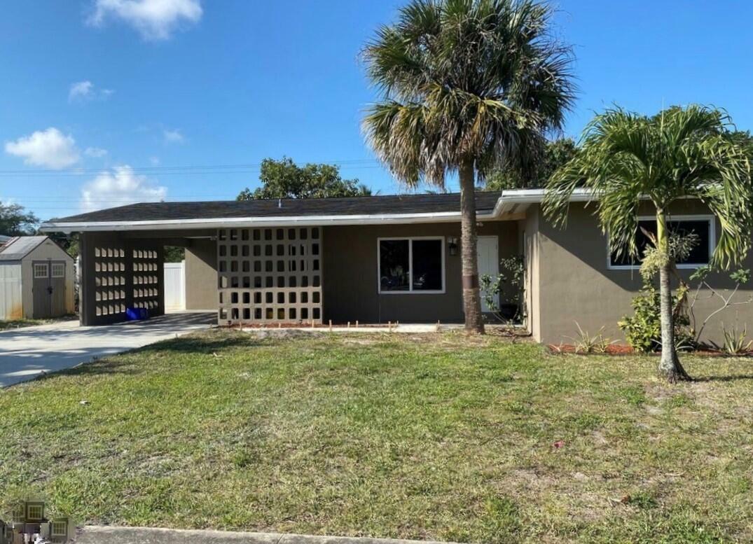 Property Photo: 1241 NW 7th Street FL 33486
