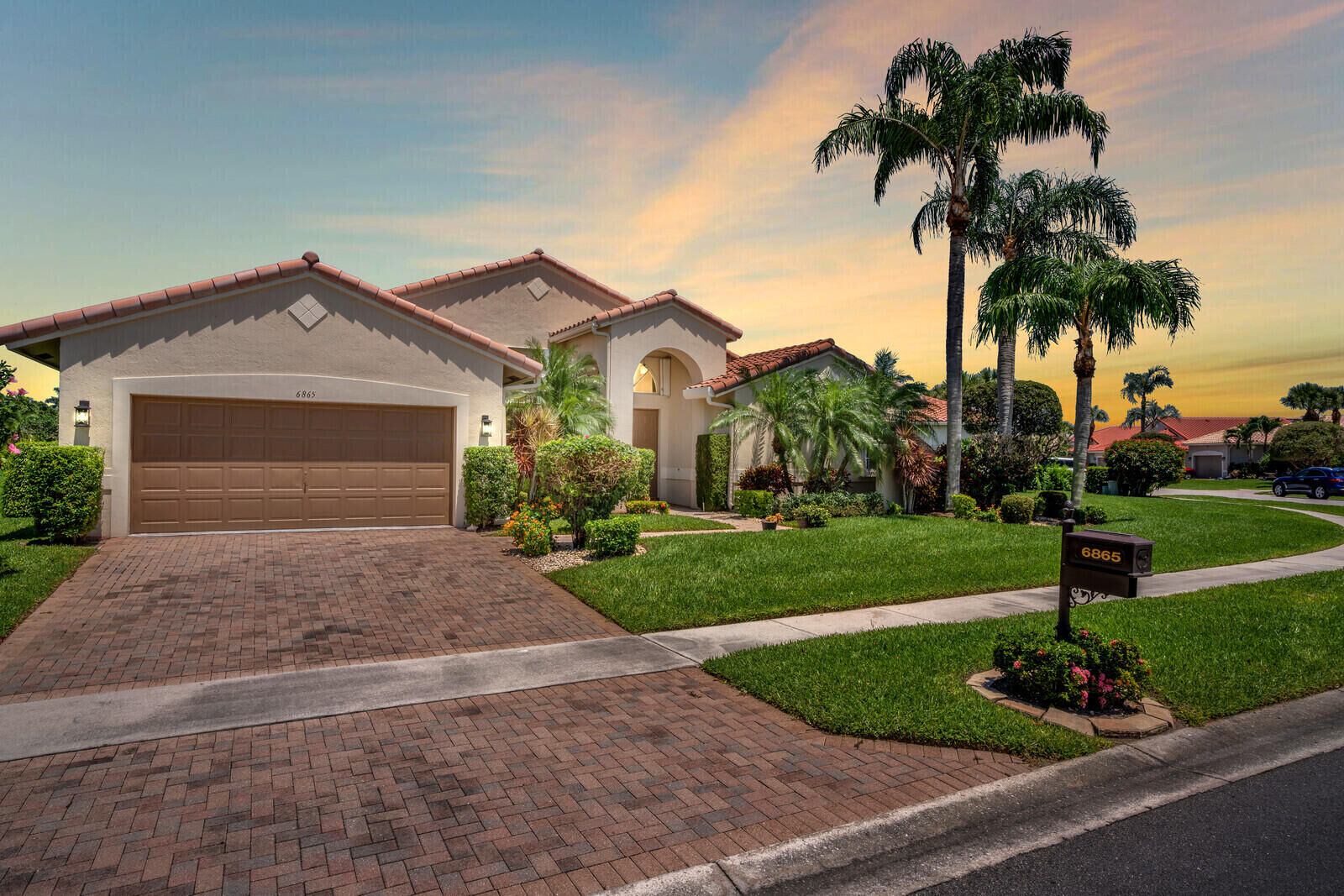 Property Photo:  6865 Treves Way  FL 33437 