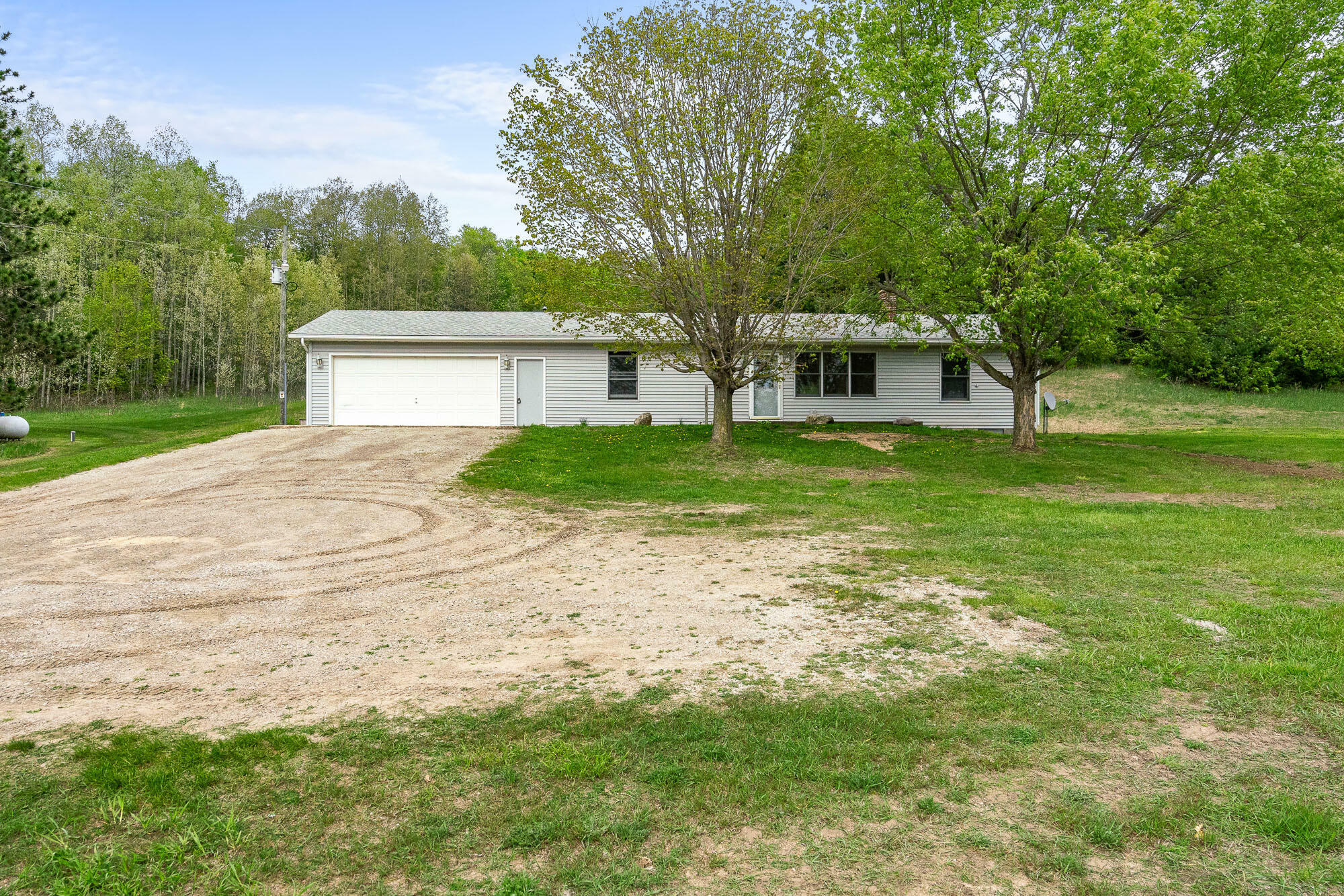 Property Photo:  6557 Reams Road  MI 49706 