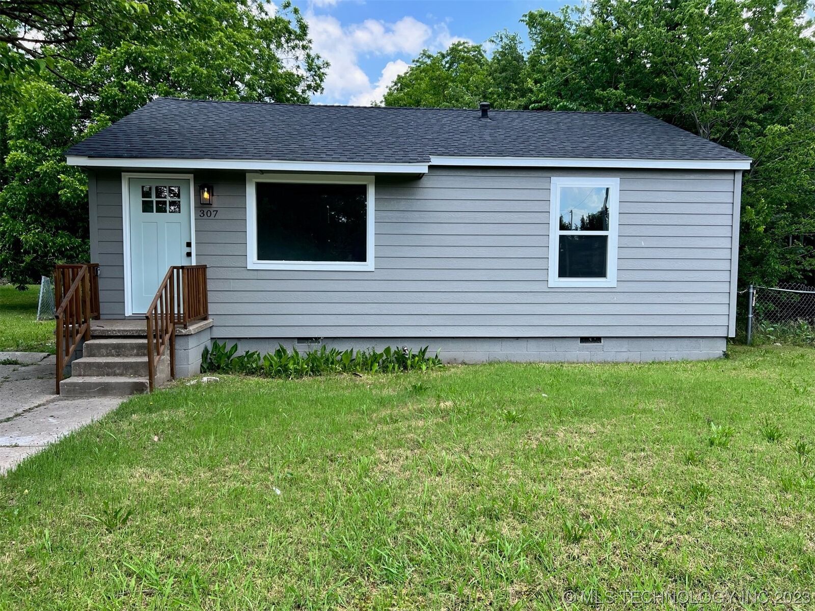 Property Photo: 307 E Virgin Street OK 74106