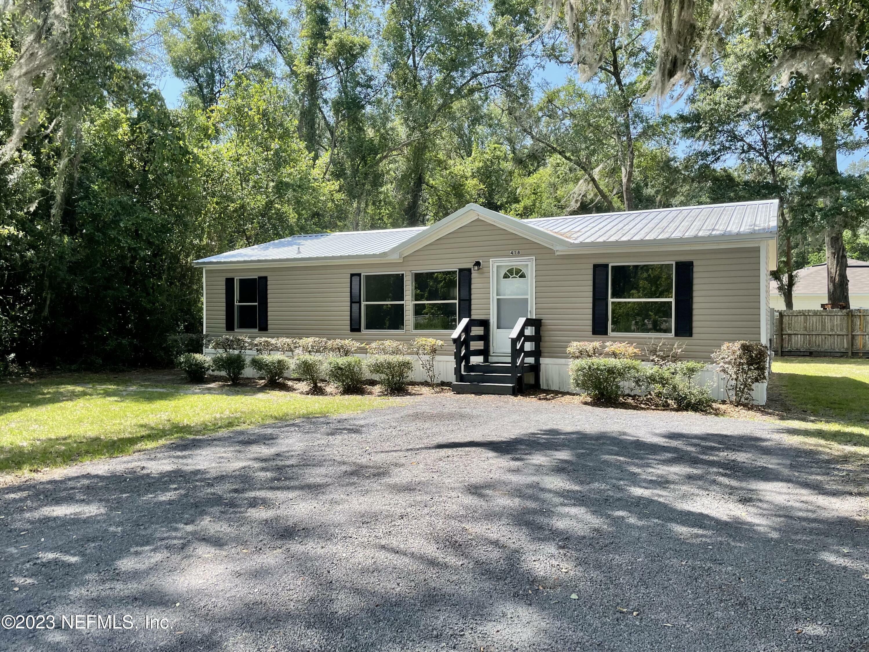 Property Photo:  418 Railroad Avenue W  FL 32063 