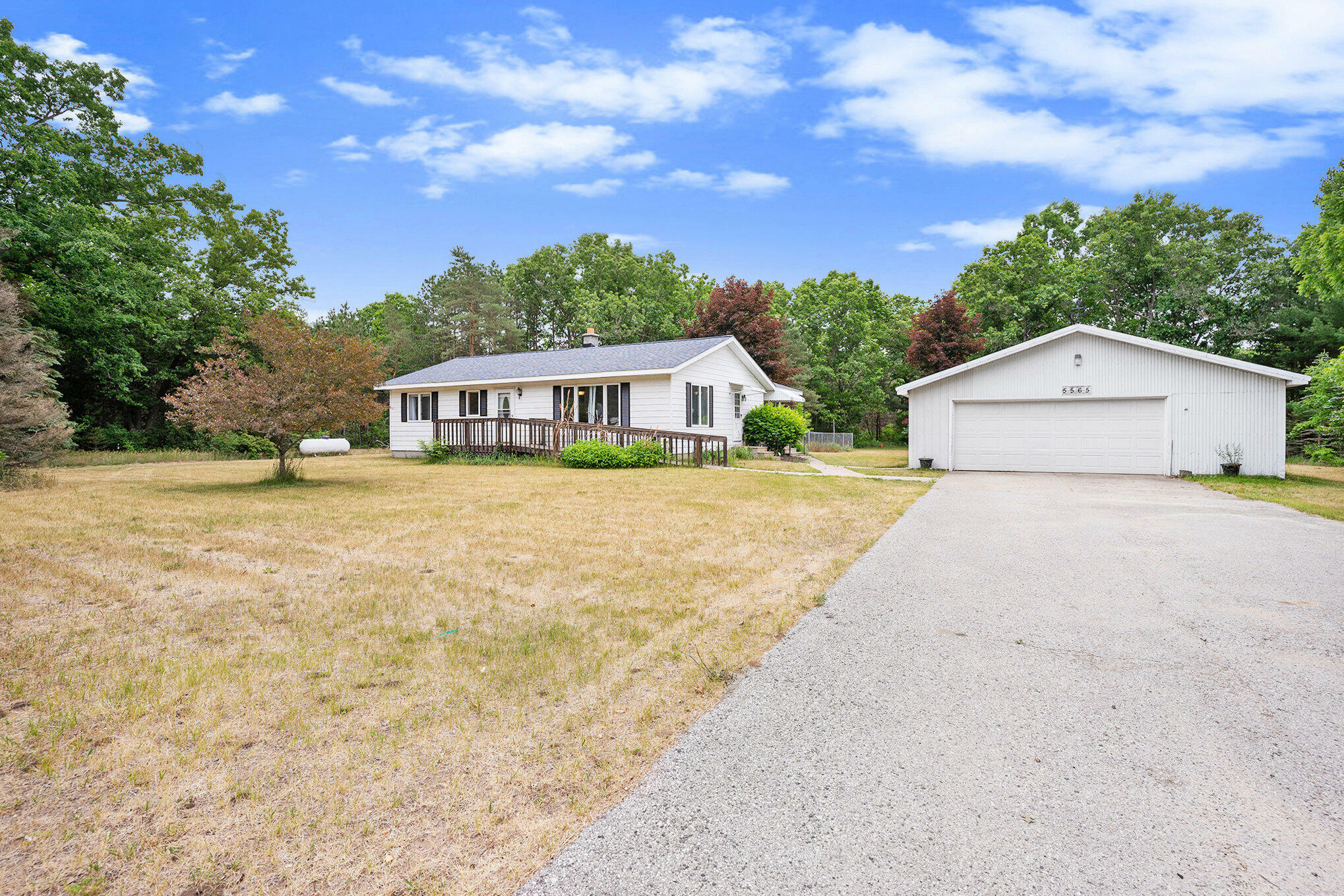 Property Photo:  5565 Holton Whitehall Road  MI 49425 